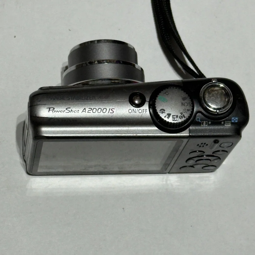 Canon PowerShot A2000 IS 10MP Digital Camera Pink For Parts Or Repair Lens Error